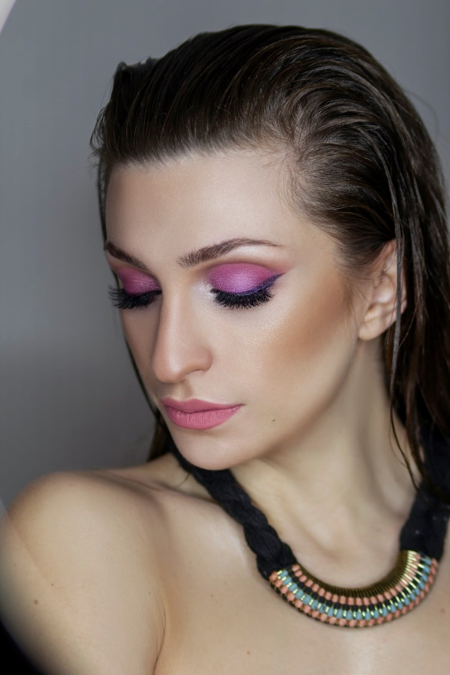A woman with purple eyeshadow